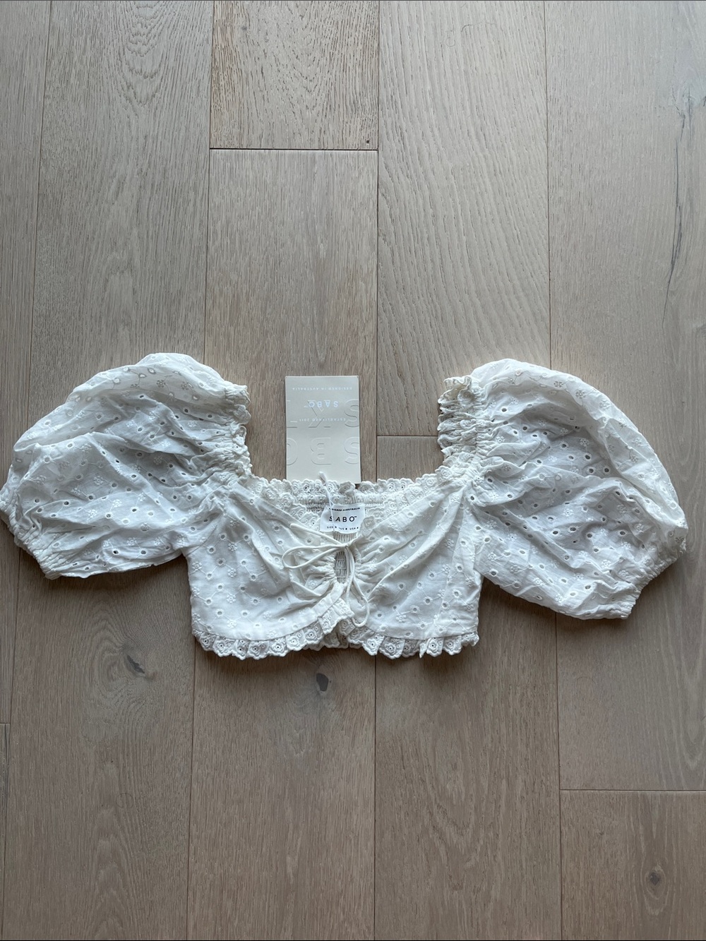Sabo Skirt White Eyelet Puff-Sleeve Crop Top with Adjustable Tie Front